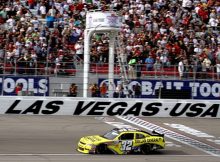 Mark Martin crosses the finish line to win the Sam's Town 300 at Las Vegas Motor Speedway. Credit: Jerry Markland/Getty Images for NASCAR